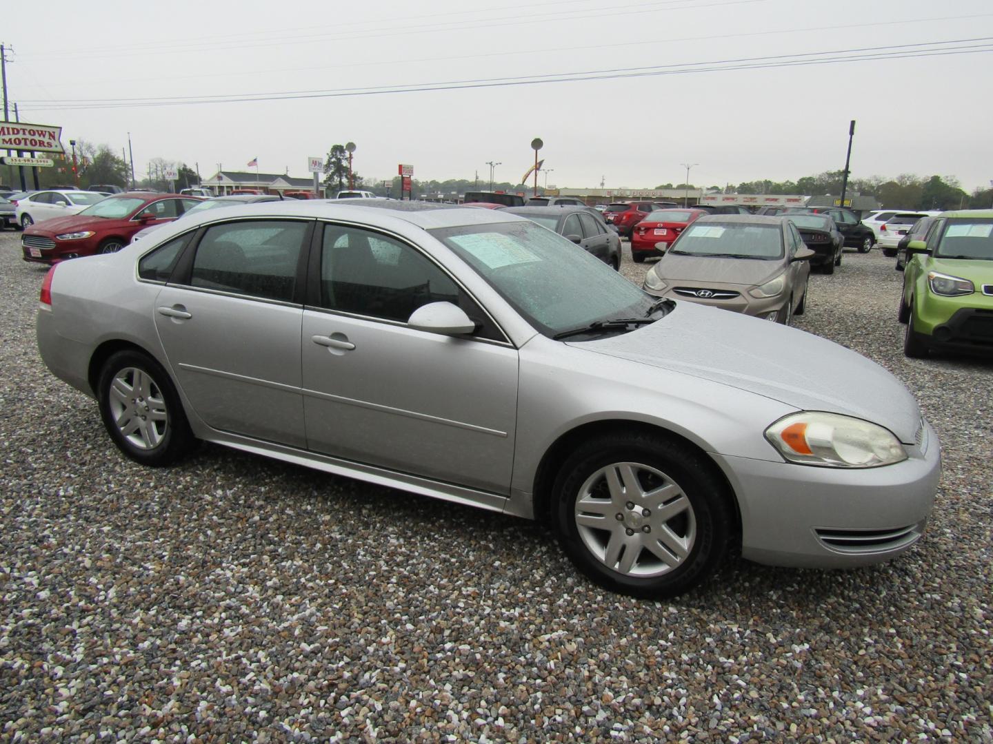 2014 Silver Chevrolet Impala LT (2G1WB5E30E1) with an 3.6L V6 DOHC 16V FFV engine, Automatic transmission, located at 15016 S Hwy 231, Midland City, AL, 36350, (334) 983-3001, 31.306210, -85.495277 - Photo#0